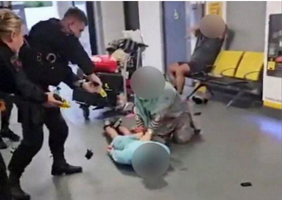 Police Brutality Under Scrutiny As Video Of Officer Stamp On Man's Head At Manchester Airport Sparks Outrage